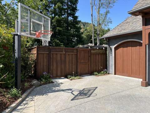Stamped concrete driveway with basketball hoop