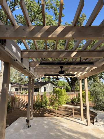 Wood pergola structure over a patio